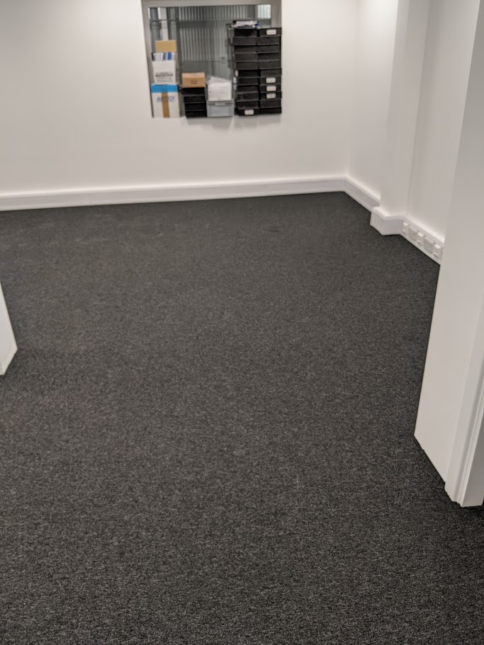 Finished carpet tiles installed in a meeting room in Sheffield